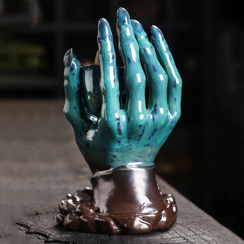 Handcrafted ceramic skull hand Buddhist meditation incense burner for mindfulness practice