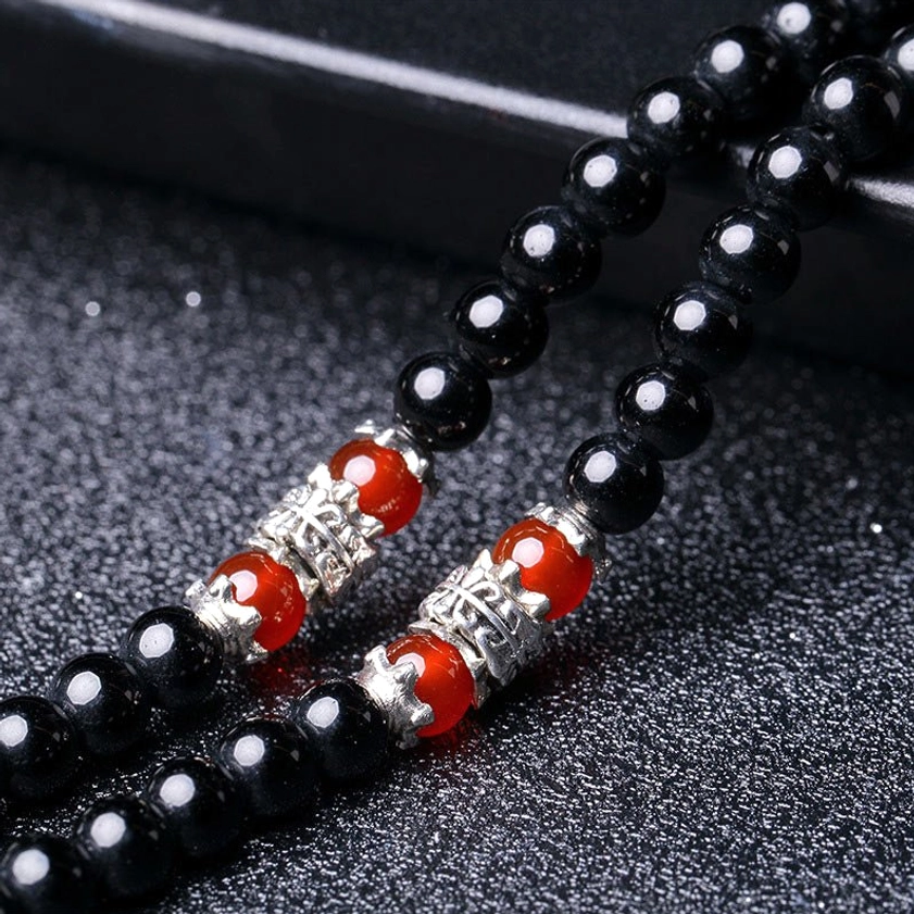 Chakra balancing 108 bead Buddhist mala with black obsidian tiger eye for meditation and energy work
