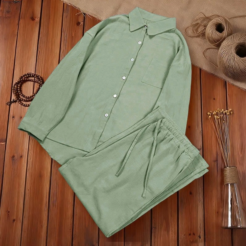 Charcoal gray meditation clothing set front view on neutral background