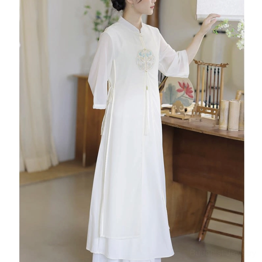Chinese meditation dress in off-white chiffon with stand collar, left side full view highlighting the elegant and flowing design