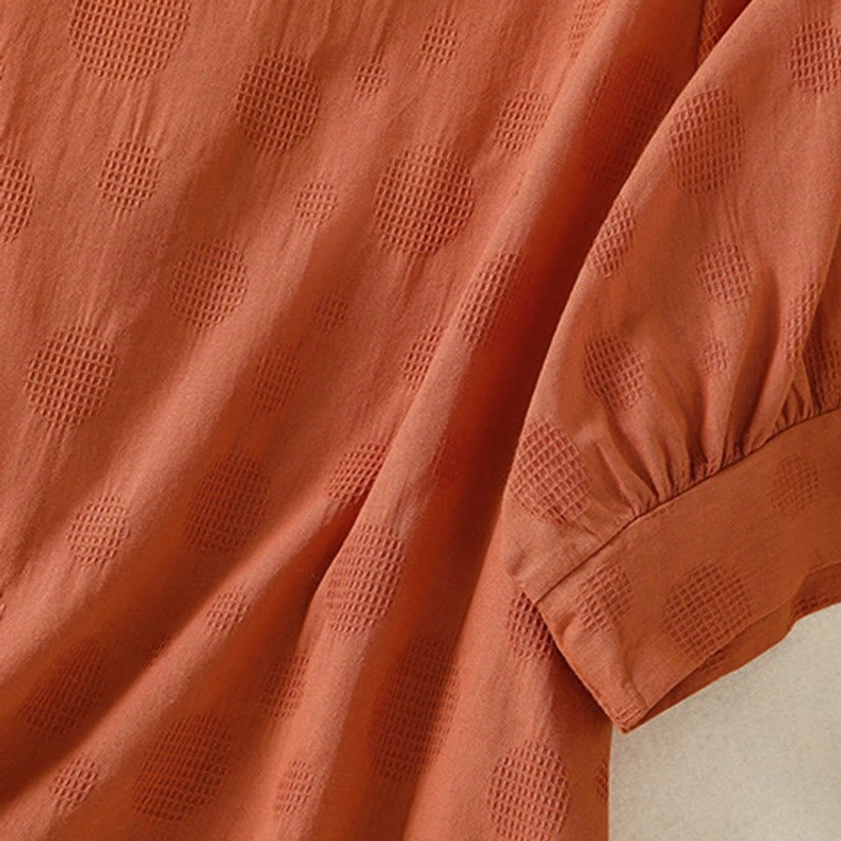 Chocolate brown premium cotton fabric texture - close-up showing embossed pattern and softness