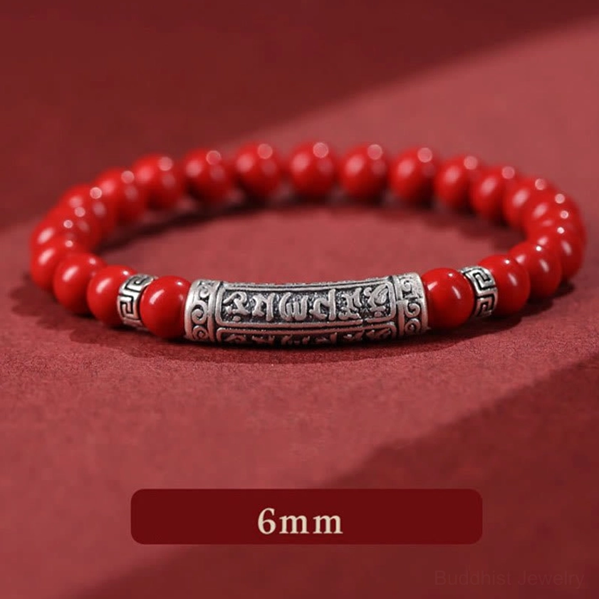 Red cinnabar 6mm beads with engraved sterling silver Om Mani Padme Hum tube charm
