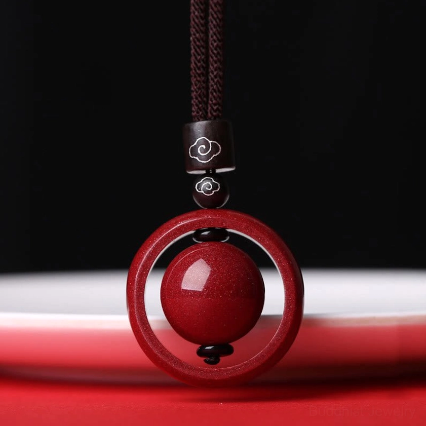 Cinnabar auspicious clouds pendant necklace with brown rope for good luck and abundance