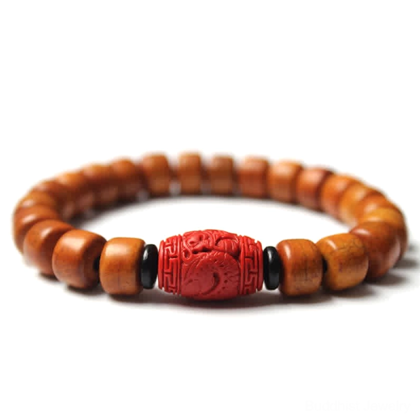 Cinnabar Buddhist bracelet for calm and concentration, warm tones with metal spacers