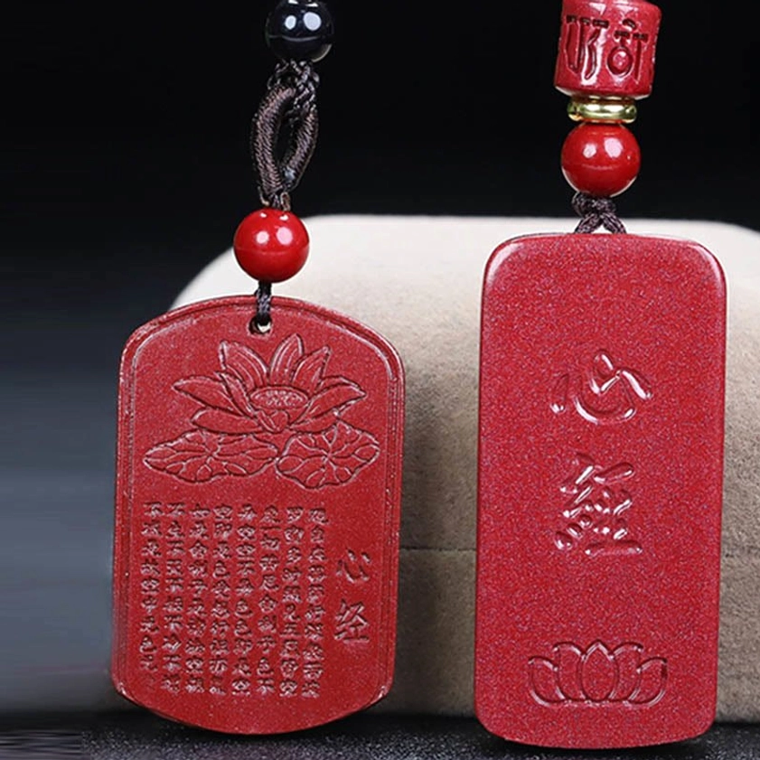 Cinnabar Buddhist prayer necklace complete product showing pendant and cord styling
