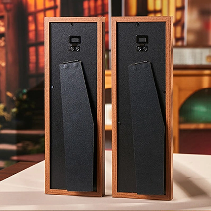 Backside of Buddhist fortune display frame showing mounting hardware and wall hanging bracket