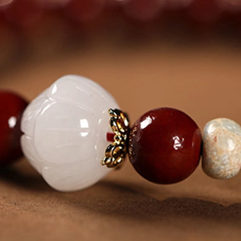 Cinnabar fu character blessing bracelet on warm brown background showing natural wood color variations