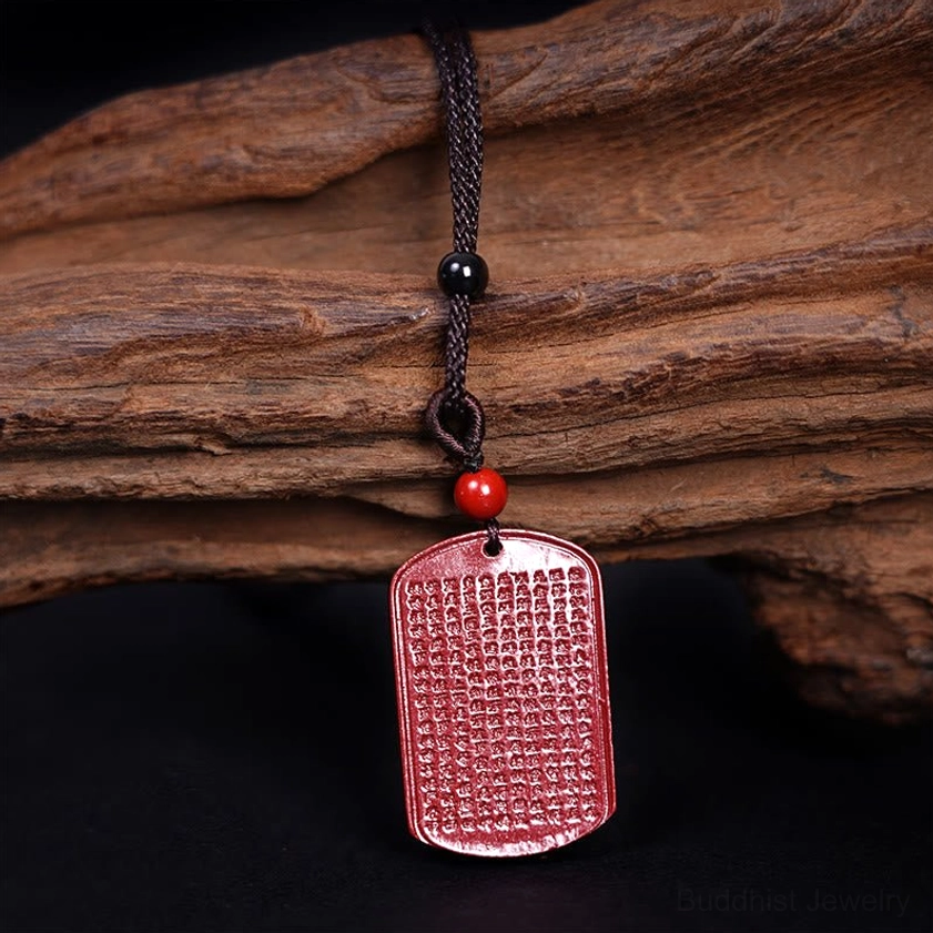Heart sutra engraved pendant reverse side showing sacred Buddhist text