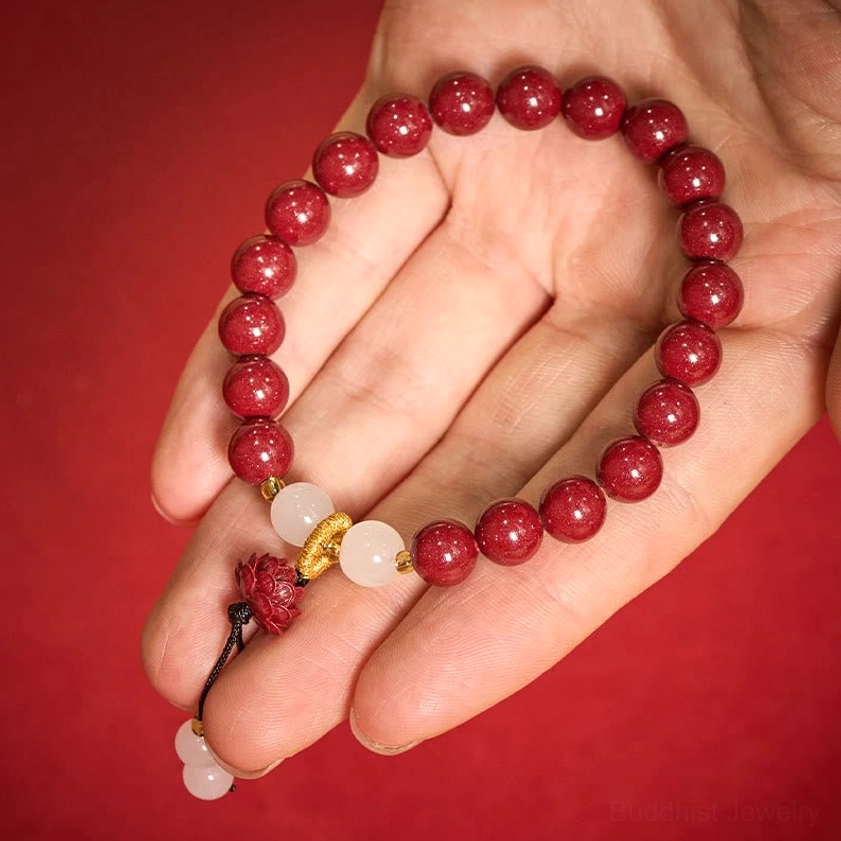 Cinnabar lotus meditation bracelet lifestyle image showing spiritual wellness and Buddhist mindfulness practice accessory