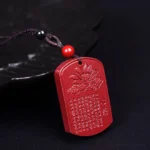 Cinnabar lotus heart sutra pendant necklace front view with red cinnabar engraved stone
