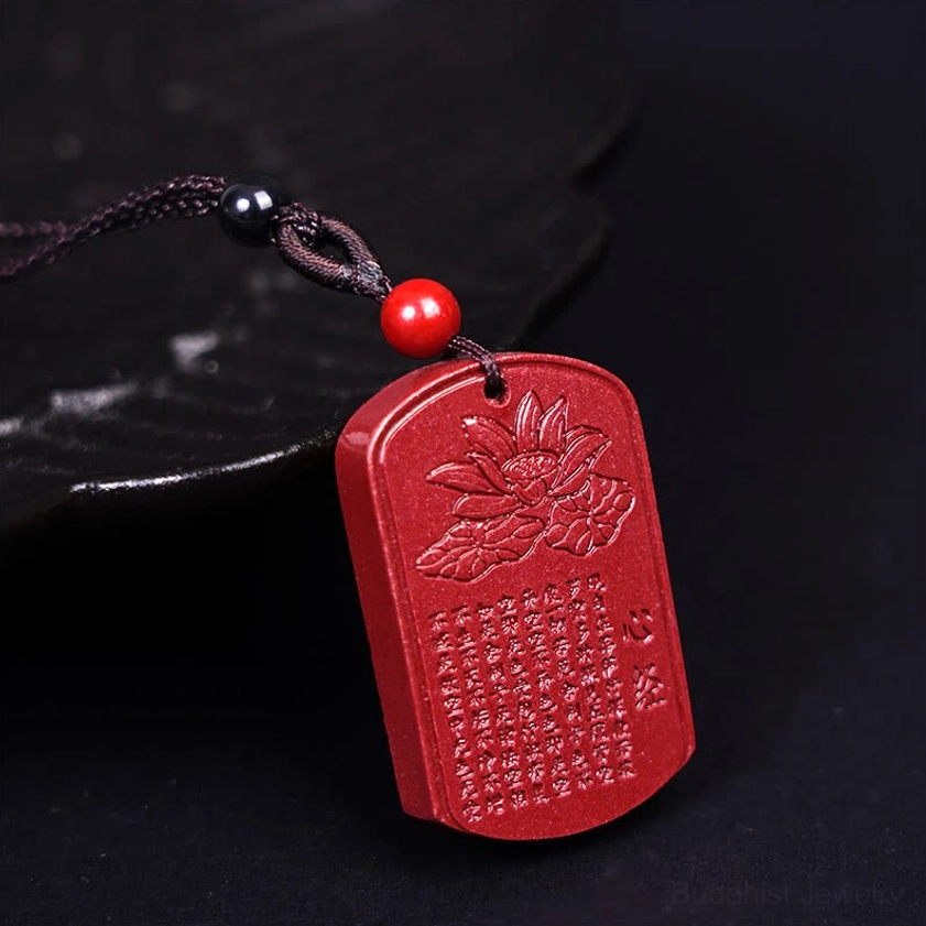 Cinnabar lotus heart sutra pendant necklace front view with red cinnabar engraved stone