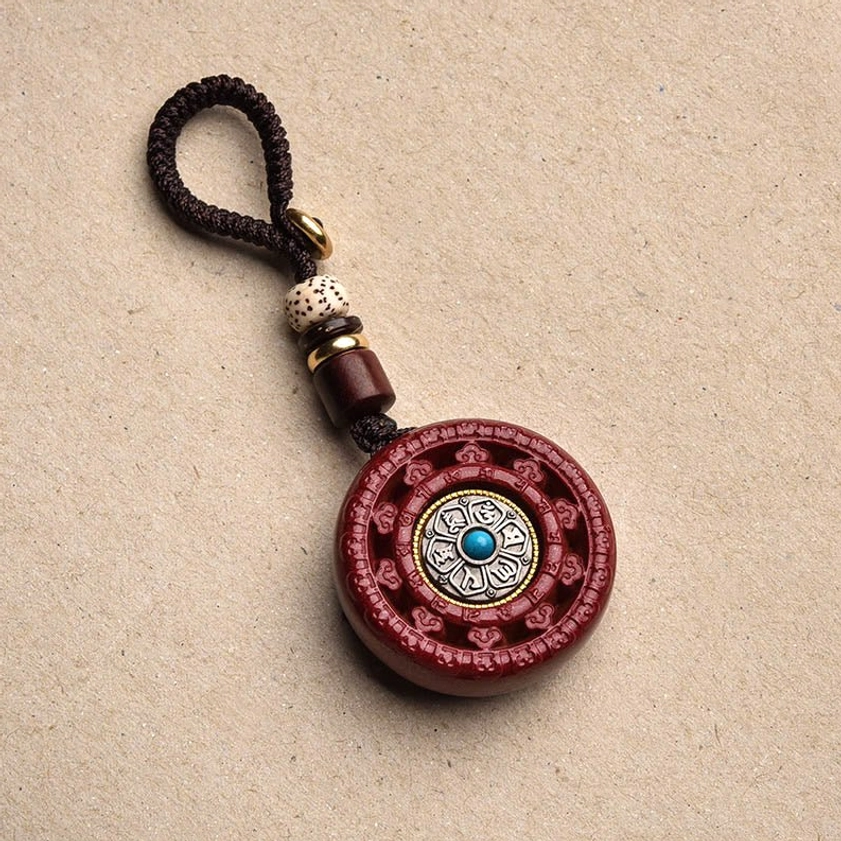 Cinnabar Om Mani Padme Hum Buddhist keychain with protective mantra and wooden beads
