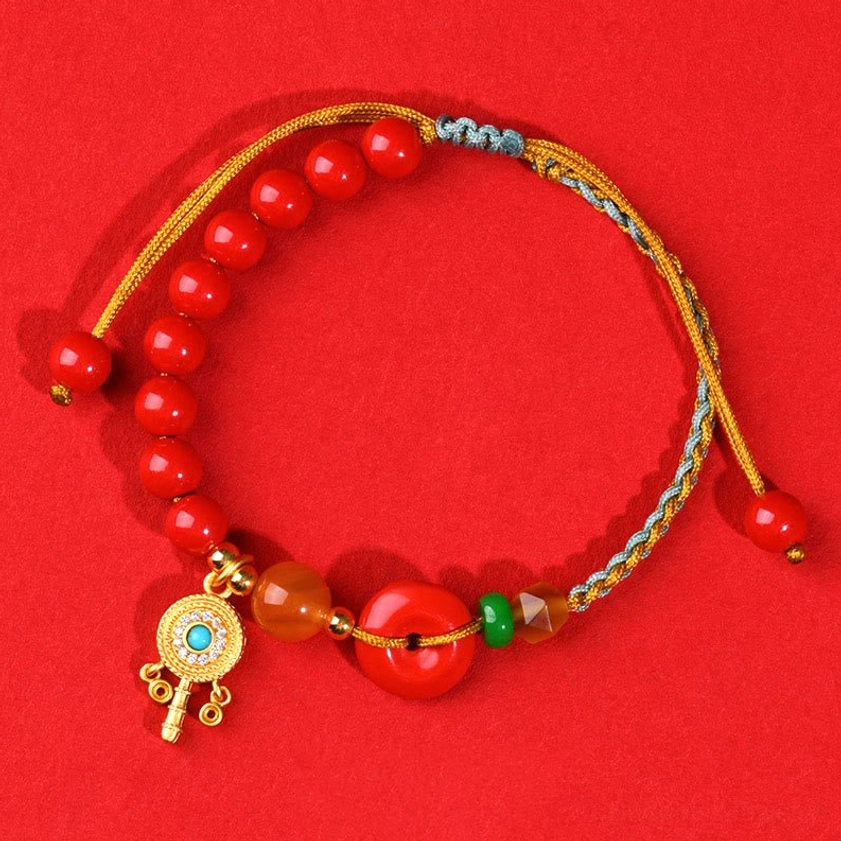 Complete circular overhead view of cinnabar peace buckle string bracelet, showing full loop and braided cord design