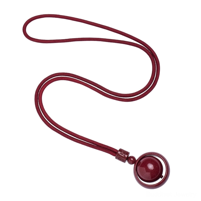 Red cinnabar pendant necklace with hollow ring design and traditional braided rope cord