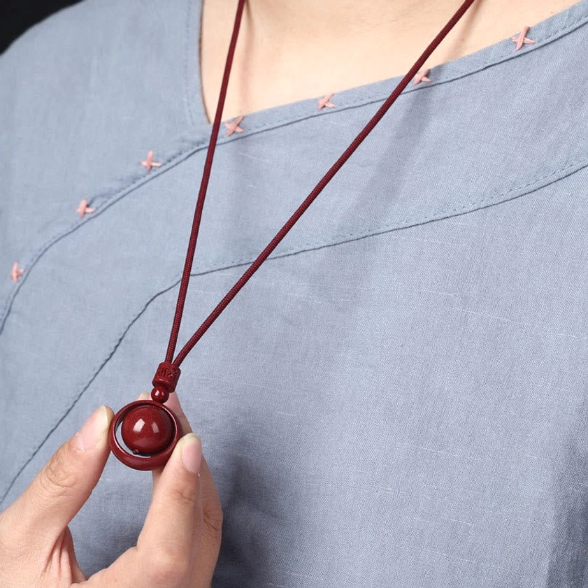 Cinnabar pendant necklace with traditional red rope and natural gemstone bead