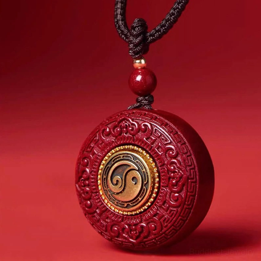 Yin Yang cinnabar Buddhist pendant with rotatable center carved frame in deep red stone