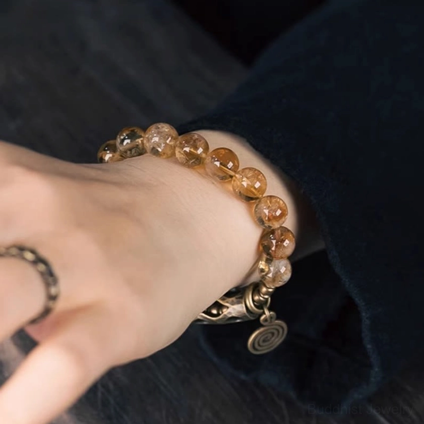Authentic citrine stone Buddhist bracelet with 10mm beads and antique brass metal accents