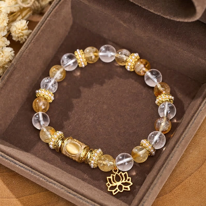 Citrine clear quartz lotus bracelet arranged in luxury velvet gift box presentation
