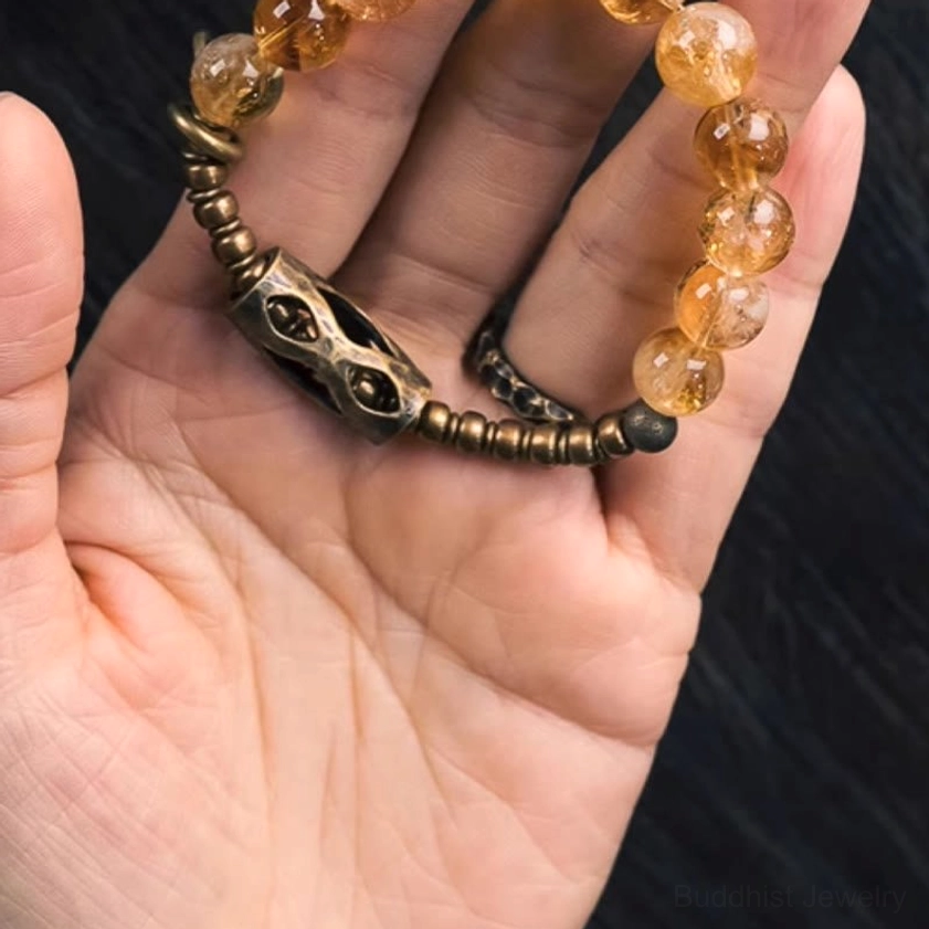 Premium handcrafted citrine Buddhist bracelet featuring natural polished beads and brass hardware