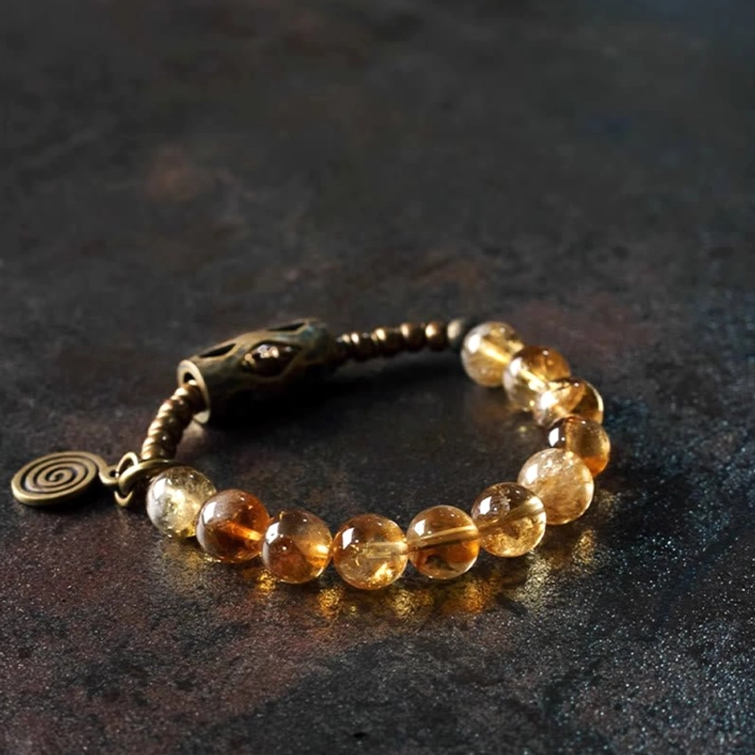 Abundance bracelet with golden citrine beads and curved brass chain metal hardware
