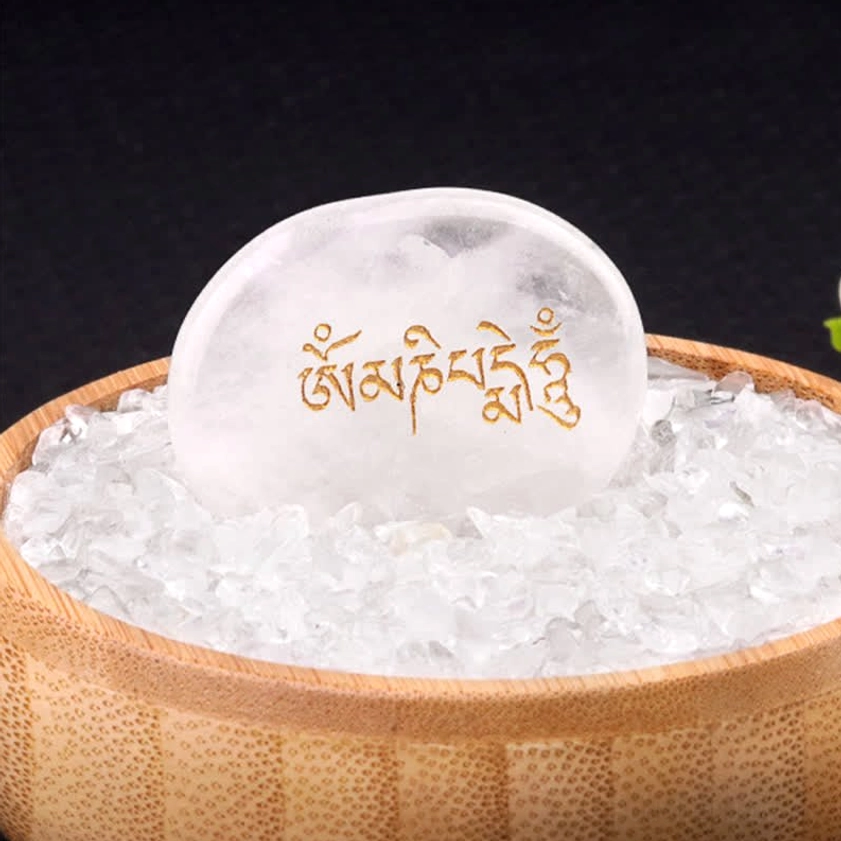 Om Mani Padme Hum clear quartz palm stone with golden Sanskrit engraving