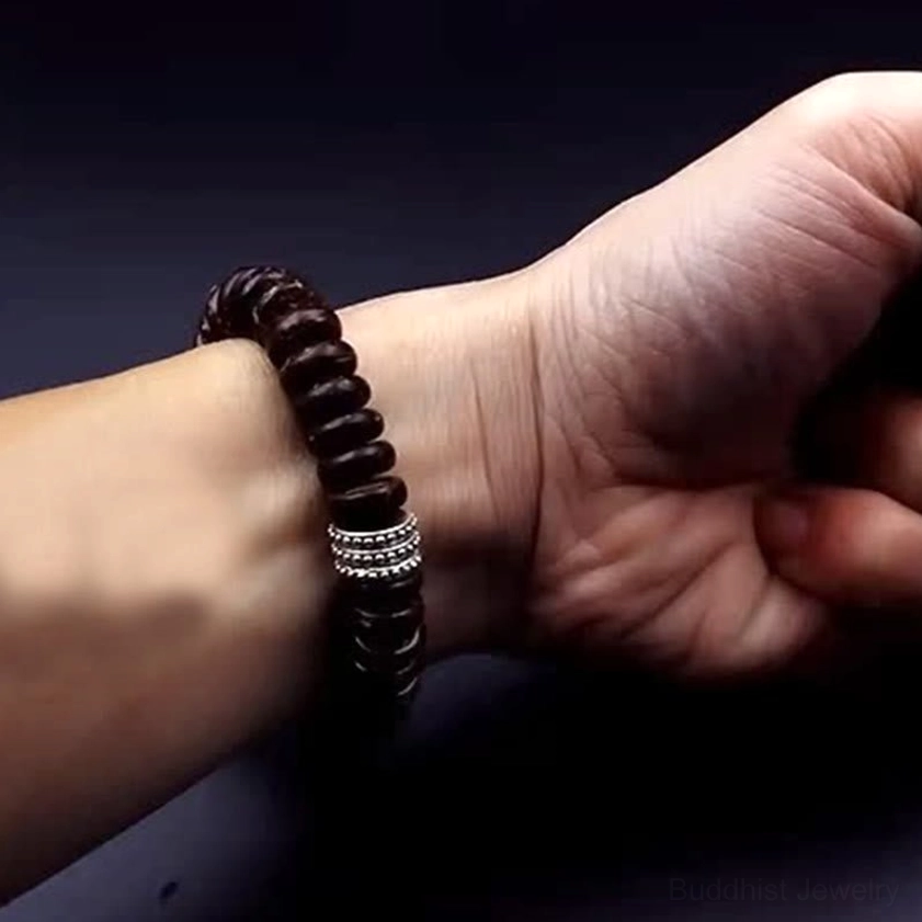 Coconut shell Buddhist bracelet for meditation and chakra healing with sacred Sanskrit mantra engraving