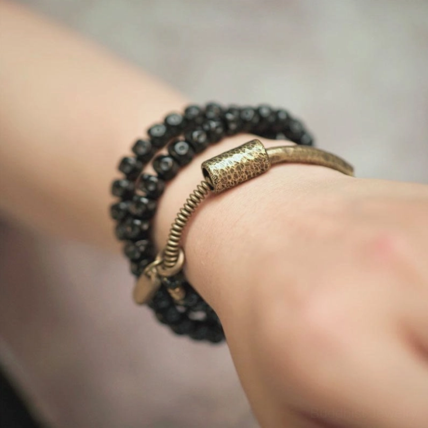 Coconut shell and brass triple wrap bracelet lifestyle wear on wrist
