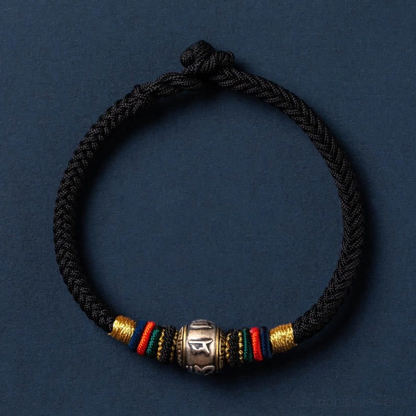 Colorful Buddhist braided bracelet collection featuring vibrant woven patterns with silver charms and multiple style options