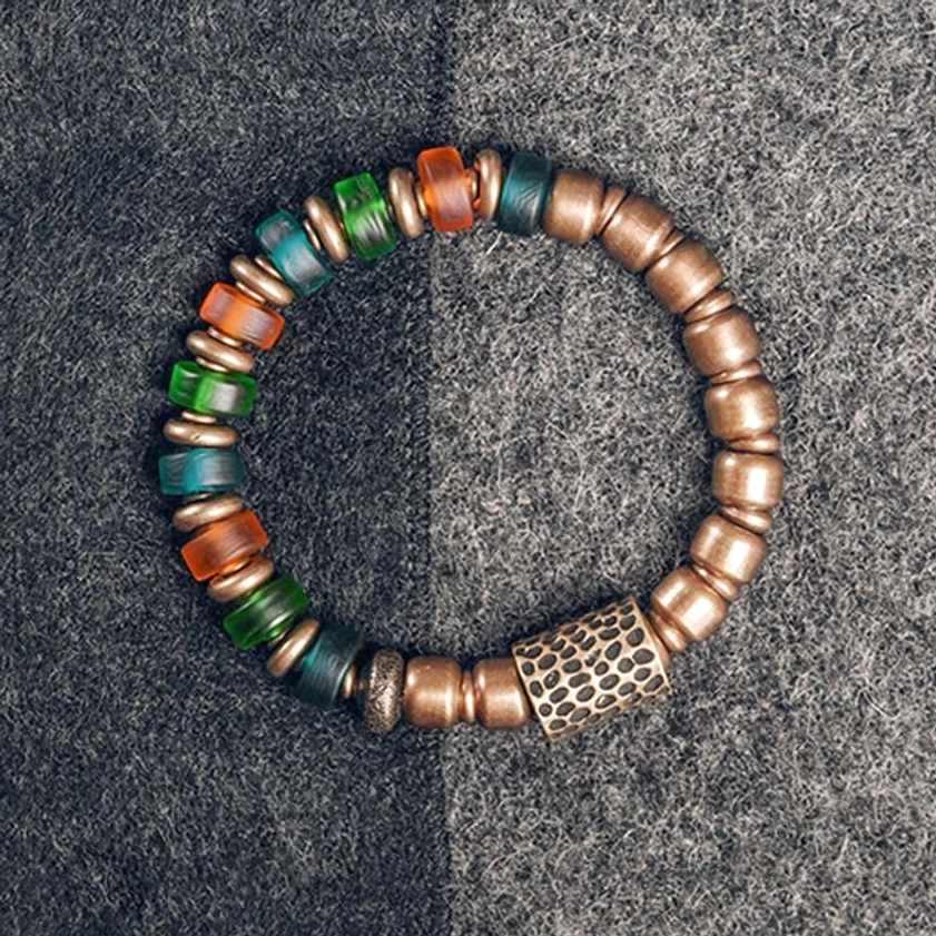 Colorful glass beads copper bracelet flat lay top-down view showing vibrant mixed bead pattern and antique copper spacer beads
