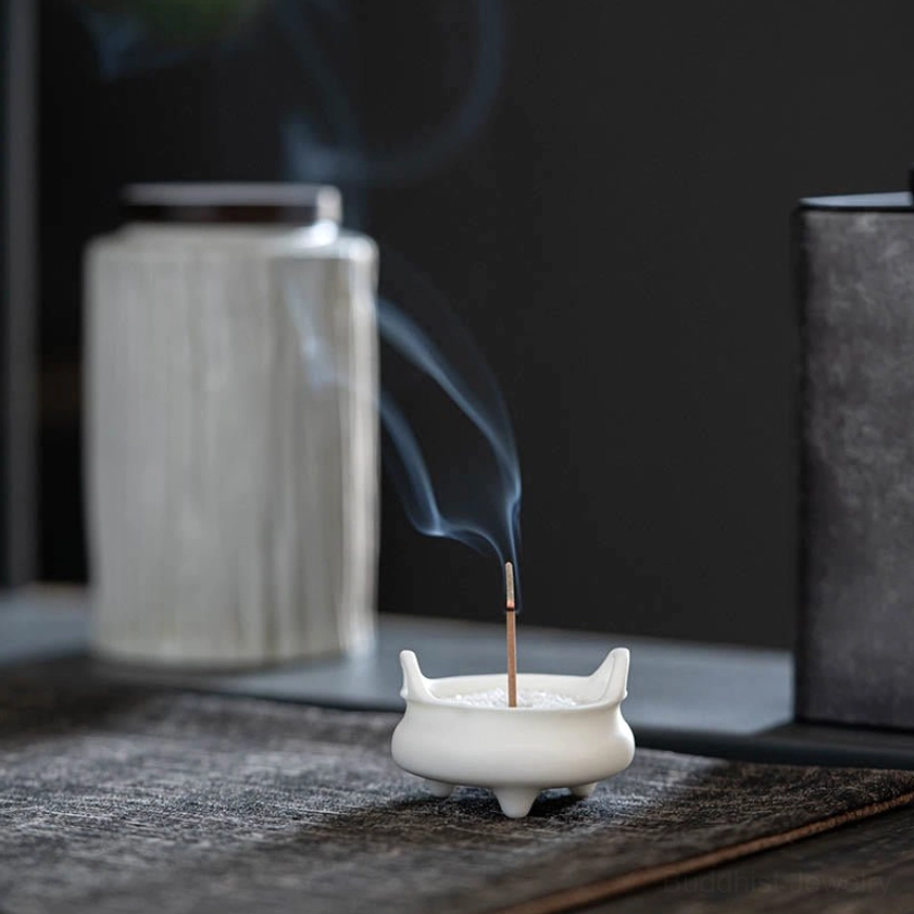 Compact ceramic incense holder with Buddhist dragon and lion ear patterns, space-saving meditation room accessory