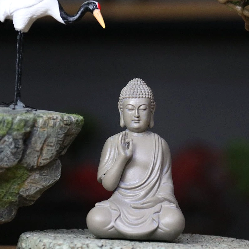 Compassion Buddha resin figurine with matte finish and serene design radiating peace and spiritual energy for home sanctuary