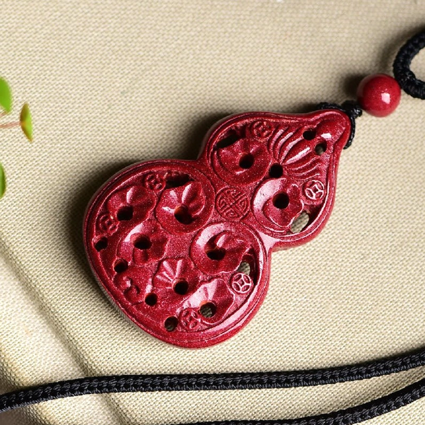 Yin Yang cinnabar Buddhist pendant necklace with complete Tai Chi symbol carving on round stone
