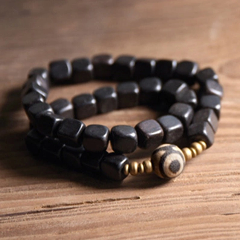 Copper accents ebony wood bracelet with nine-eye dzi bead, healing and abundance bracelet