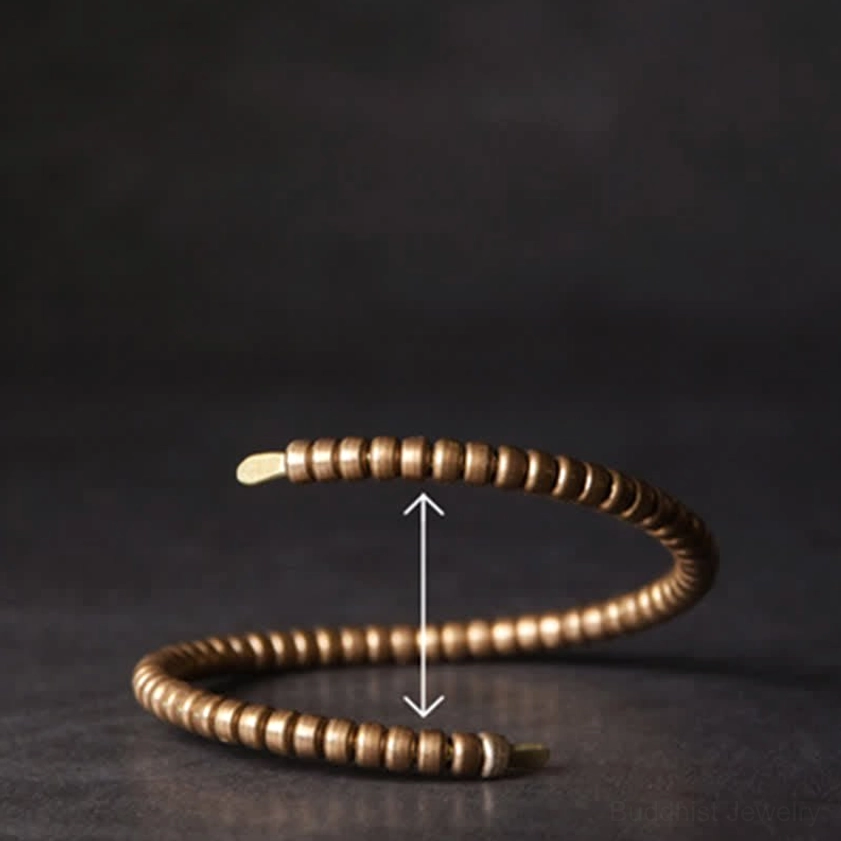 Adjustable copper balance cuff bracelet, side angled view highlighting open cuff width design