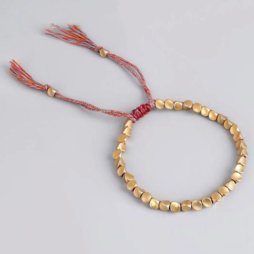 Handcrafted copper bead bracelet detail view showing premium quality beads and traditional artisan craftsmanship for Buddhist spiritual practice