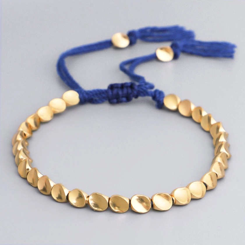 Blue rope copper bead bracelet with calming blue braided cord, perfect for meditation, tranquility and spiritual peace