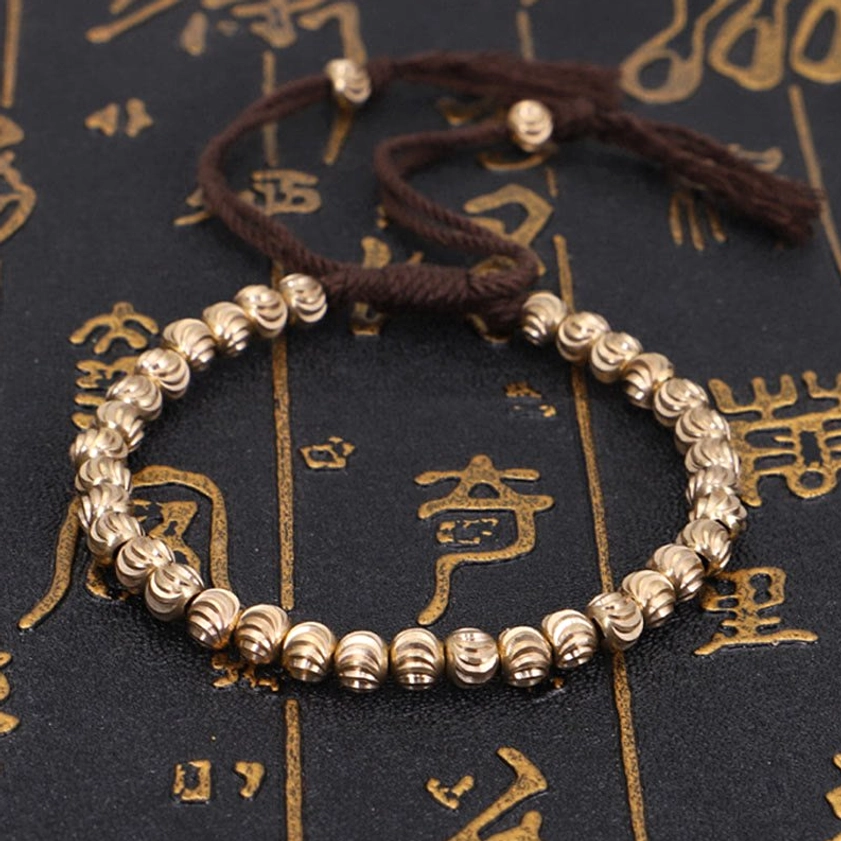 Copper bead Buddhist bracelet collection showing multiple color options for spiritual wellness