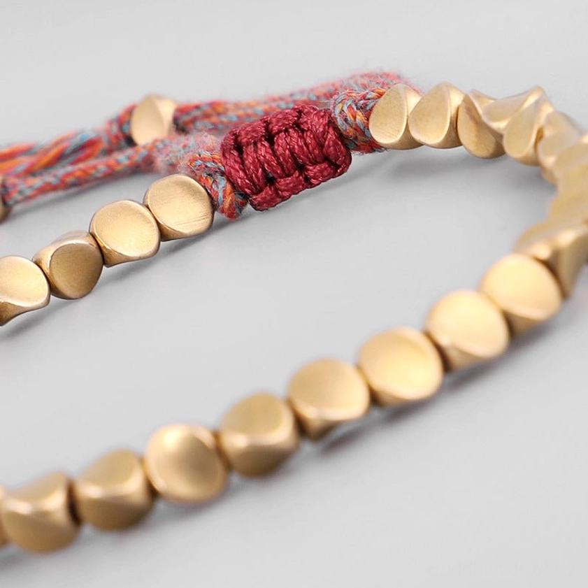Adjustable copper bead bracelet for unisex wear, showing comfortable fit and versatile design suitable for all spiritual practitioners