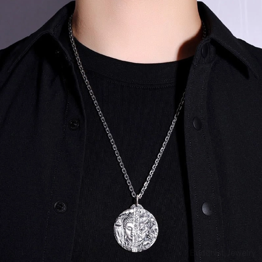 Buddhist copper pendant necklace worn on neck with black casual shirt, demonstrating real-life wearing effect and size