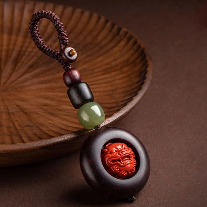 Buddhist protection keychain with copper coin charm for prosperity and spiritual blessings
