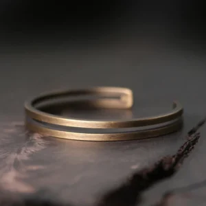 Antique bronze double-layer open cuff bracelet with adjustable sizing for protection and prosperity
