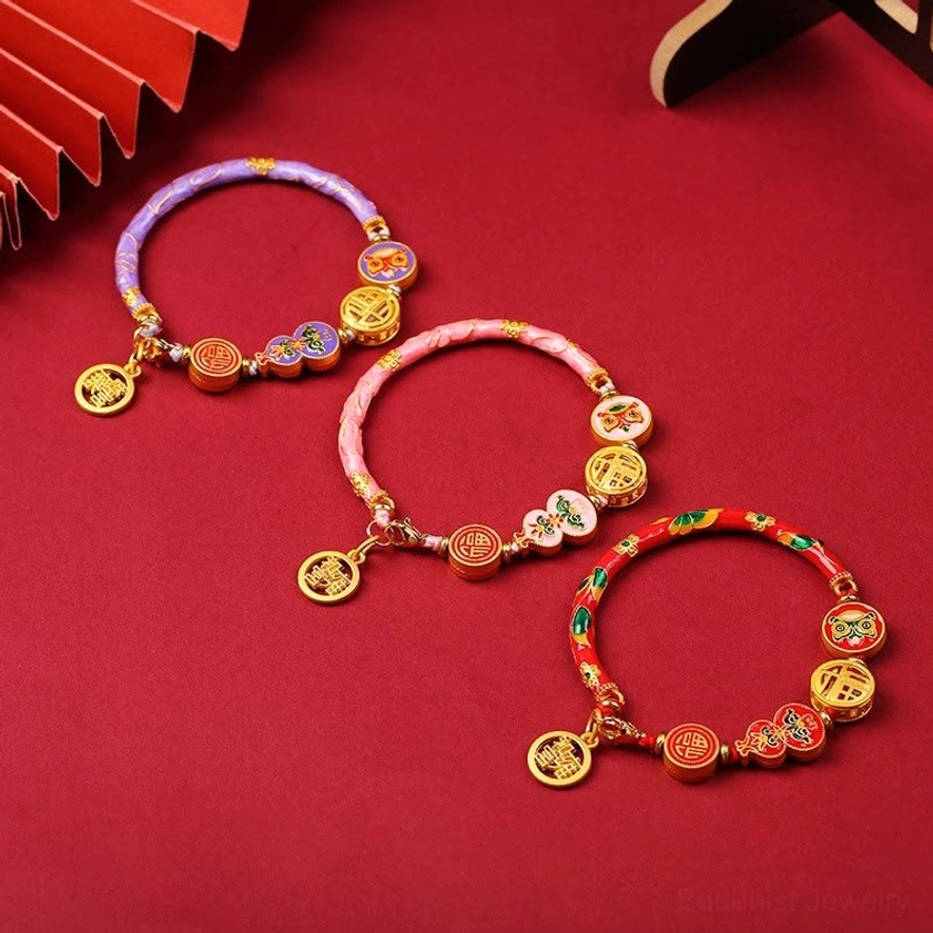 Handcrafted copper lion gourd prosperity bracelet detail showing enamel craftsmanship and metal work