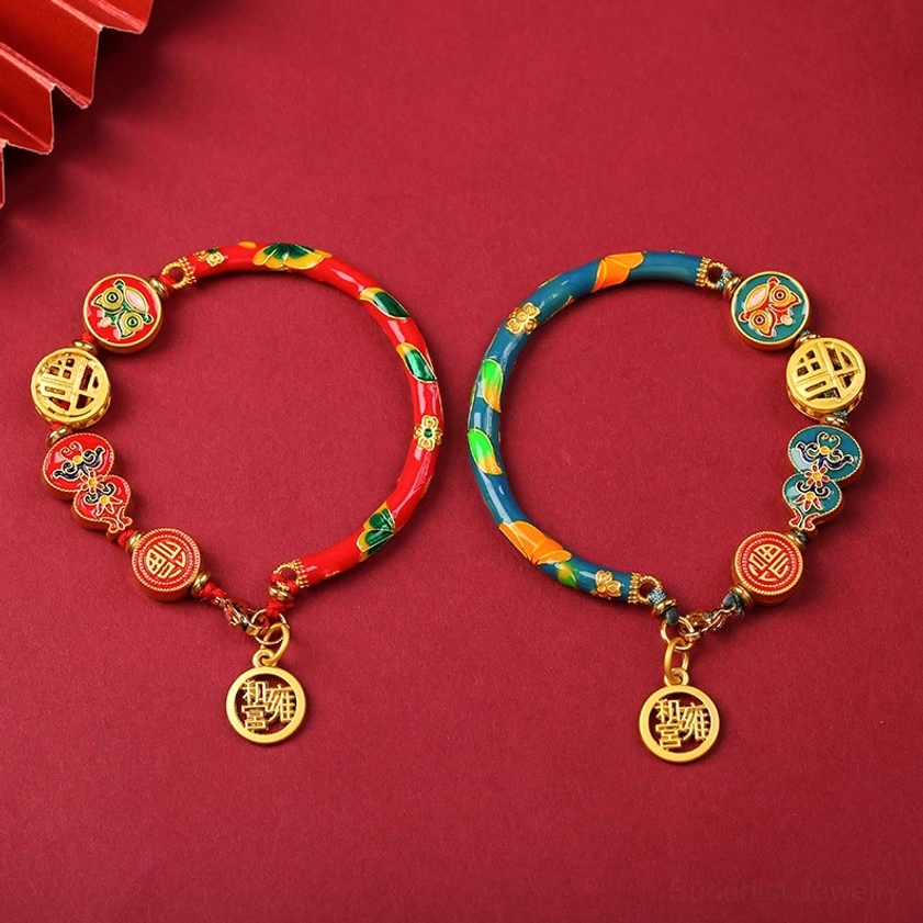 Red and blue-green enamel copper lion gourd prosperity bracelets with fu gold pendants side by side