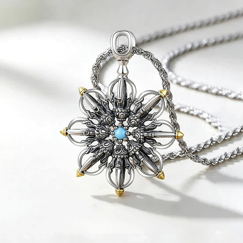 Copper lotus pendant necklace with silver finish and decorative accents, overhead close-up on white background