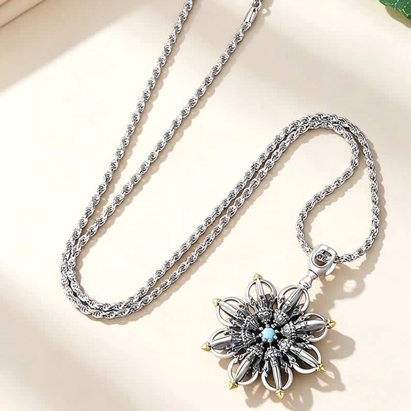 Lotus pendant necklace with twisted silver chain, angled view showing pendant and chain together