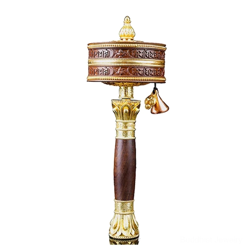 Copper Buddhist prayer wheel with sacred mantra symbolizing compassion, wisdom, and spiritual enlightenment
