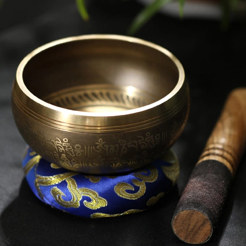 Handcrafted copper Buddhist singing bowl with wooden mallet and protective meditation cushion - complete starter set