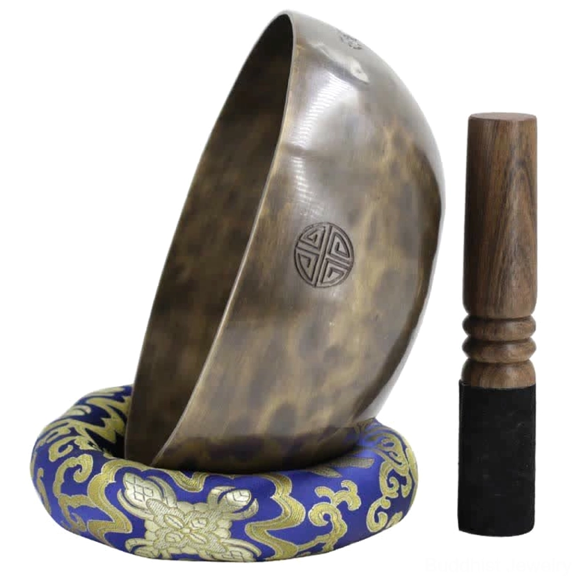 Copper singing bowl with traditional craftsmanship details and lunar emblem