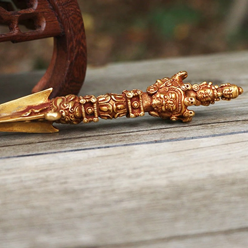 Alternative angle of handcrafted copper Vajra Dorje displaying complete carved surface and authentic patina of handmade meditation tool