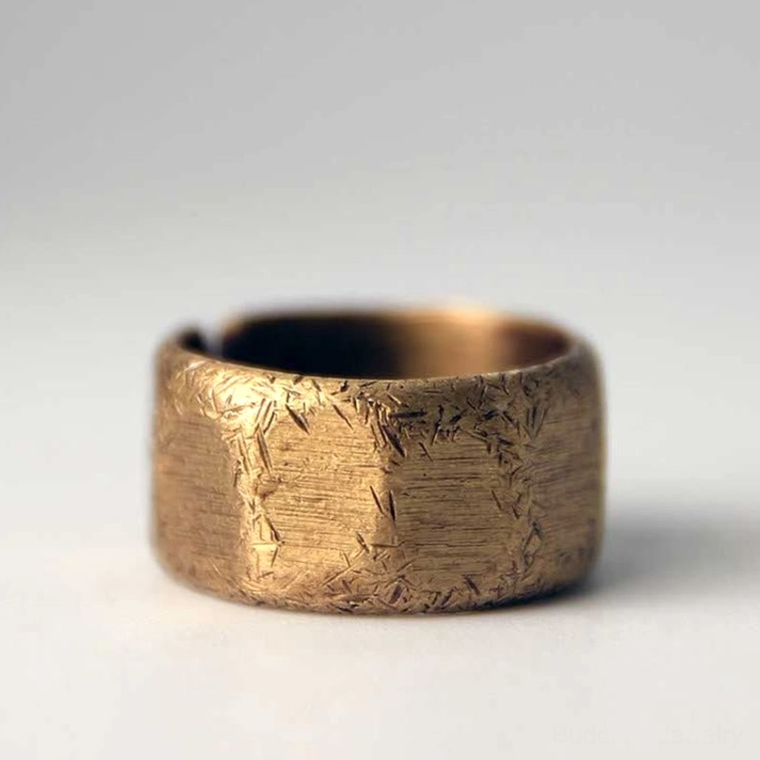 Frosted copper brass adjustable wealth ring showing frosted matte finish and meditation practice use
